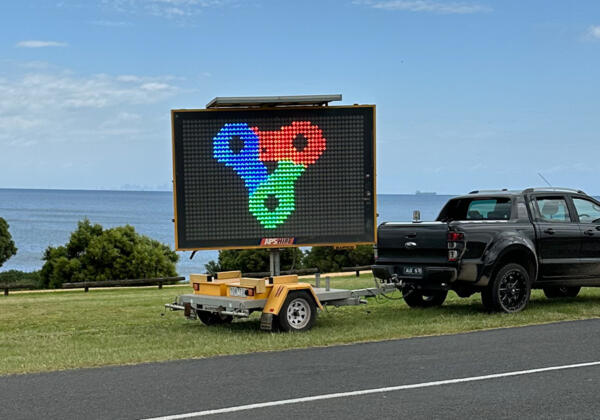 An electronic business advertising sign in Victoria.